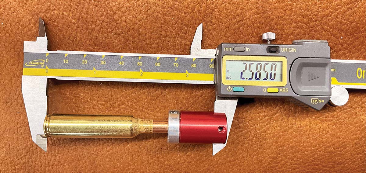 Proper cartridge measurement is done base to ogive using a comparator.